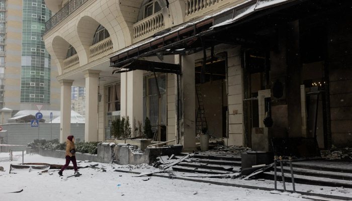 “Smoke and fire rise after Russia launches a missile strike on Ukraine, marking a sharp escalation in the ongoing war.”