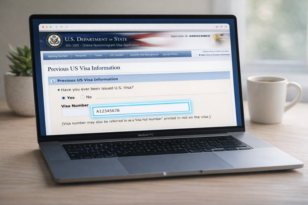 DS-160 nonimmigrant visa application form on laptop showing visa number input field highlighted