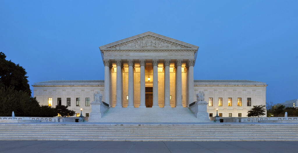 U.S. Supreme Court building at dawn representing the 2026 H1B visa legal battle